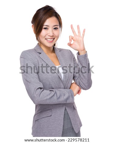 Businesswoman with ok sign