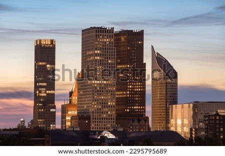 This picture shows the skyline of Den Haag (The Hague) in the Netherlands. Enjoy the view of the skyscrapers in the twilight.