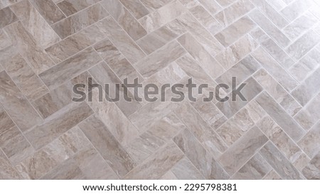 Marble tiles texture with a shallow depth of field for perspective background