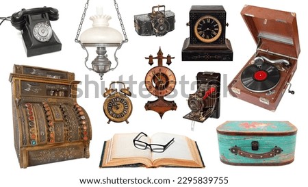 Vintage objects isolated on white background. Vintage and antique alarm clock, desktop clock, lamp, photo camera, suitcase, telephone, microphone, books, glasses and record player