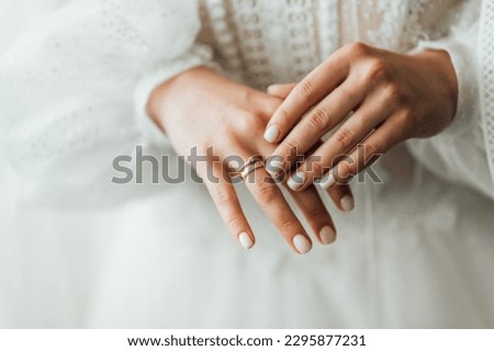 Picture of man and woman with wedding ring.Young married couple holding hands, ceremony wedding day. Newly wed couple's hands with wedding rings. Royalty-Free Stock Photo #2295877231