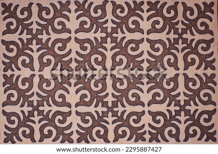wool carpet with Kazakh pattern Royalty-Free Stock Photo #2295887427