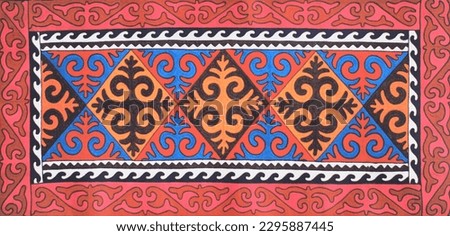 wool carpet with Kazakh pattern Royalty-Free Stock Photo #2295887445