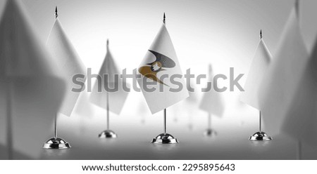 The national flag of the Eurasian Economic Union surrounded by white flags. Royalty-Free Stock Photo #2295895643