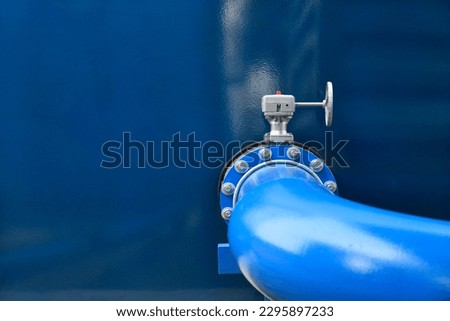 Water steel pipe and water valve close up image. Select focus of drink water piping. Flange Pipe Fitting Royalty-Free Stock Photo #2295897233
