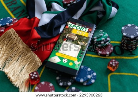 smartphone with sports betting, casino, flag UAE