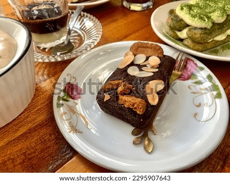 pieces of chocolate steamed cake served on a coffee shop table