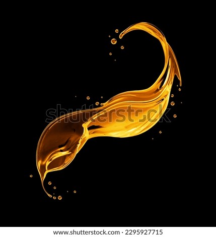 Beautiful splash of sunflower oil on a black background Royalty-Free Stock Photo #2295927715