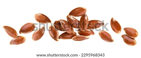 Group of brown flax seeds isolated on a white background, top view. Royalty-Free Stock Photo #2295968343
