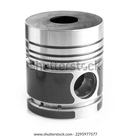 New Piston from a car engine isolated on white background Royalty-Free Stock Photo #2295977577