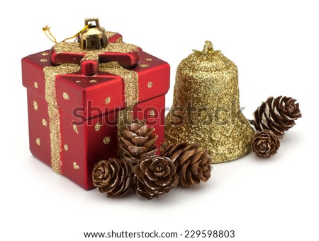 Christmas boxes, bell and pine cones decor isolated on white background
