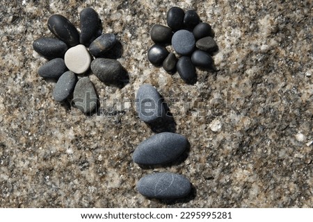 Abstract human face made of different stones.