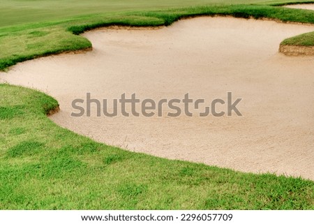Golf course sand pit bunker aesthetic background,Used as obstacles for golf competitions for difficulty and falling off the course for beauty. Royalty-Free Stock Photo #2296057709