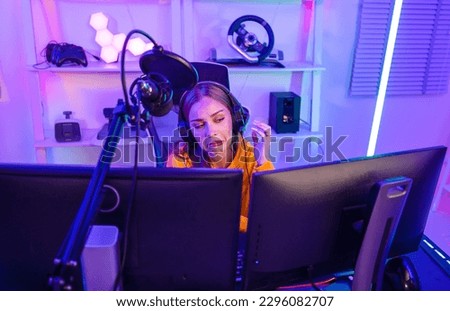 Professional gamers are frustrated, disappointed with the negative results of competition. A loss can result in failing to earn prizes, commissions, and praise from major brands and tournaments. Royalty-Free Stock Photo #2296082707