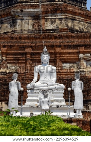White  buddha statue in Yai chaimongkol temple in Ayuttaya, Landmark of tourists from around the world.