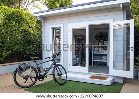 View of a backyard shed Royalty-Free Stock Photo #2296094807