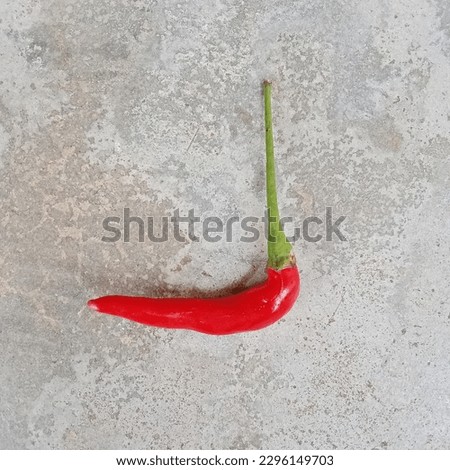 Fresh red chili peppers, also known as Chiradamanee red peppers.