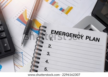 Concept of Emergency Preparedness Plan.Emergency Plan  list with notebook.Business Evacuation Training concept. Royalty-Free Stock Photo #2296162307