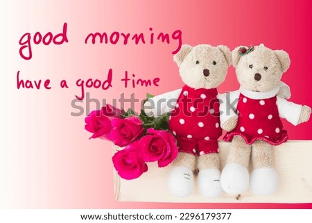 good morning have a good time message card handwriting with couple teddy bear and red rose arrangement flat lay postcard style on background red