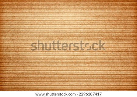 Beige cardboard background with vertical strips, paper texture for design.