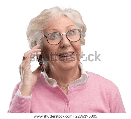Modern happy senior lady having a phone call on her smartphone and smiling, elderly and communication concept