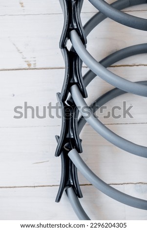 gymnastic ring for pilates of gray color on a light background