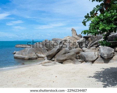 Koh Samui, Thailand - July 31 2022: Hin Ta Hin Yai rocks. This natural phenomenon originates from the granite eroded by sea water. Royalty-Free Stock Photo #2296234487