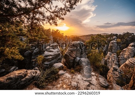 Cesky raj sandstone cliffs - Prachovske skaly in summer sunset, Czech Republic. Rock labyrinth is tourist attraction in Bohemian Paradise, Czech Republic Royalty-Free Stock Photo #2296260319