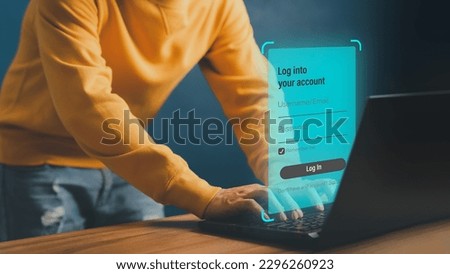 Young man typing his user and password on a computer laptop. Cyber security concept to protect personal data. Secure encryption and access to the user's private information to access the internet.