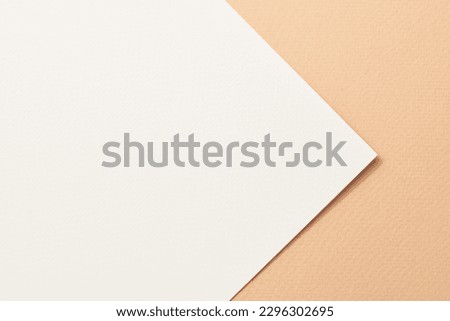 Rough kraft paper background, paper texture beige white colors. Mockup with copy space for text Royalty-Free Stock Photo #2296302695