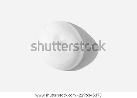 A large drop of foam. a smear of foam texture. Royalty-Free Stock Photo #2296345373