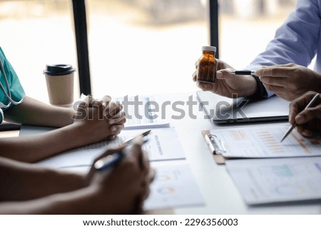 Conference room in the hospital, a group of doctors attending a meeting of drug presentations, a meeting of executive doctors and chiefs meeting with drug dealers. Doctor meeting concept.