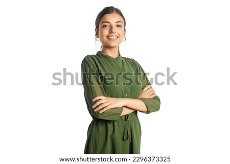 Young Modern Asian Indian happy confident woman with crossed arms smiling and standing isolated on white background. Concept of Self-love, success, achievement, and Leadership