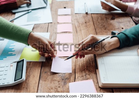 Group Asian Young woman business join hands for working  job success, Hand coordination, symbolizing the hands to unity and teamwork, meeting, helps , business concept Royalty-Free Stock Photo #2296388367