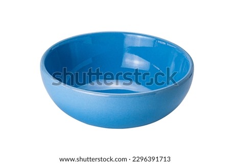 Empty blue ceramic bowl isolated on white background with clipping path. High angle view of deep round blue bowl isolated. Royalty-Free Stock Photo #2296391713