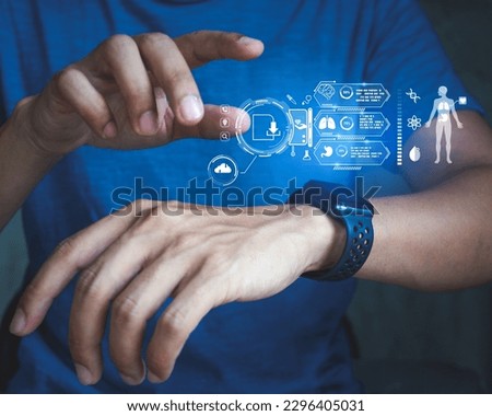 Medical technology and futuristic concept.Digital healthcare and network on modern virtual screen.Smart watch Health Check with digital system support for patient with medical icon at hospital. Royalty-Free Stock Photo #2296405031