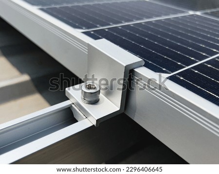 Up close in using clamps to fix the edge of the solar system. Royalty-Free Stock Photo #2296406645