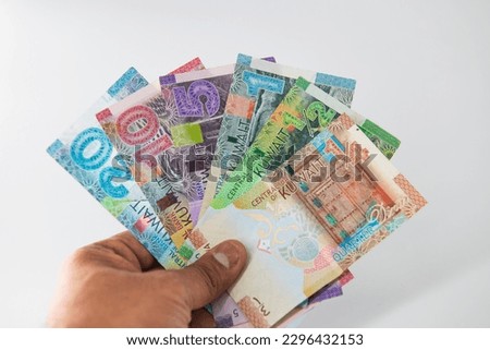 Selective focused , Full set of Kuwaiti Dinar bank paper notes. Kuwait dinar bank notes 0.25KWD, 0.5KWD, 1KWD, 5KWD, 10 KWD and 20 KWD.  Royalty-Free Stock Photo #2296432153