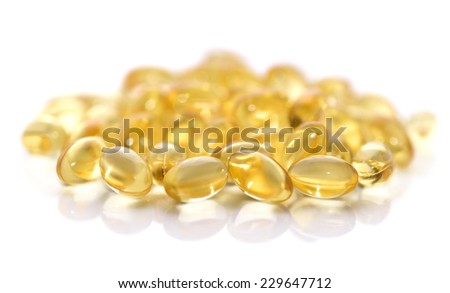 Cod liver oil omega 3 gel capsules isolated on white background 