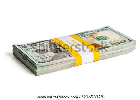 Creative business finance making money concept - bundle of 100 US dollars 2013 edition banknotes (bills) isolated on white