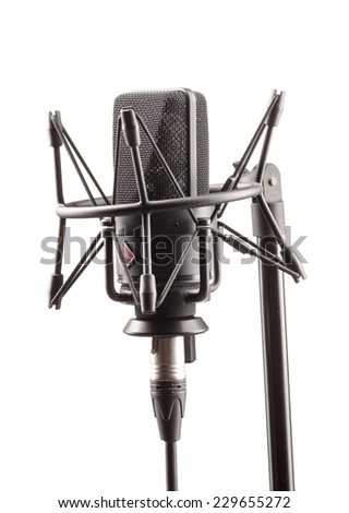 Microphone in broadcasting station isolated on white