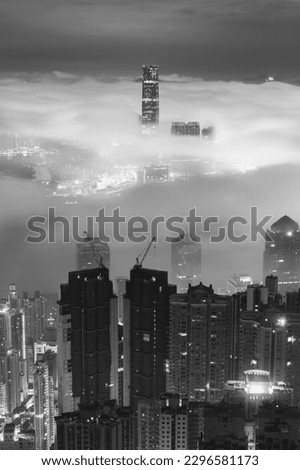 Night scenery of skyline of Hong Kong city in fog