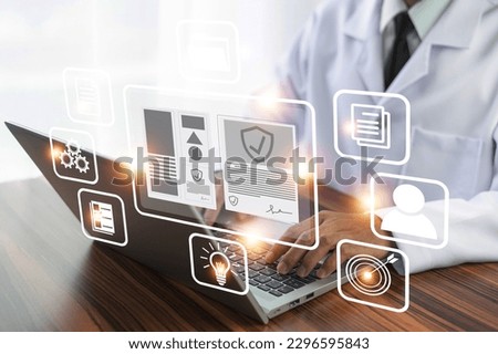 Doctor using technology document management on computer system management for cardiologist Specialist in treating heart disease for treatment in hospital , DMS document management concept Royalty-Free Stock Photo #2296595843