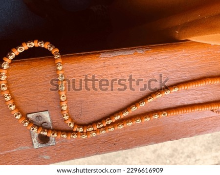 This name kalung toraja (acsesories) Toraja necklaces are very valuable for Toraja people, usually these necklaces are used at certain events such as funerals (rambu solo) and weddings (rambu tuka). Royalty-Free Stock Photo #2296616909