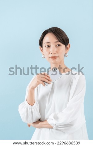 Asian woman with a smartphone
