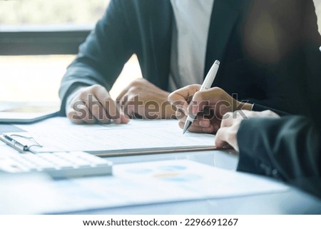 Business man sign a contract investment professional document agreement, ready signing profitable offer agreement after checking contract terms of conditions, executive manager involved in legal