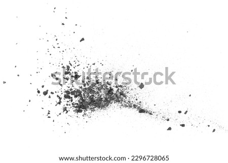 Black coal dust with effect fragments explosion isolated on white background and texture, clipping path Royalty-Free Stock Photo #2296728065