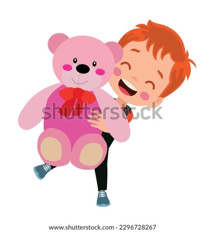 A boy is holding a pink teddy bear