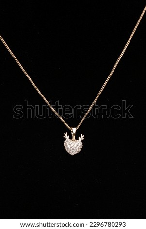 Heart design necklace with diamonds