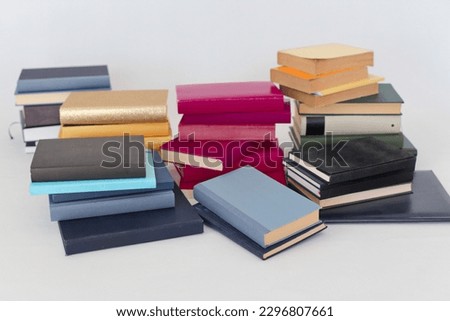 Colored books on white background